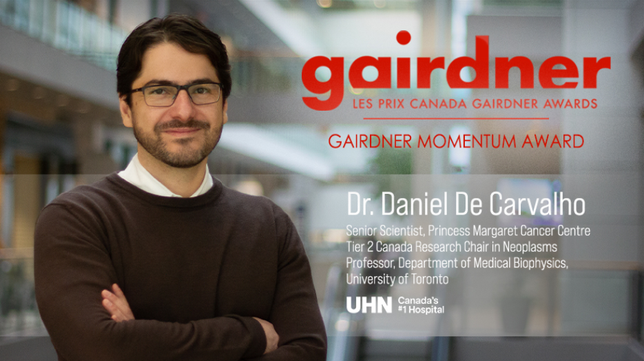 Smiling man with arms crossed next to text about his award